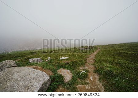 Spooky Trail In The Ghost Town Of Independence Mine Alaska At Hatcher Pass On A Misty Foggy Day