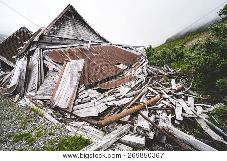 Ruins Of An Old Abandoned Mining Building At Independence Mine Along Alaska's Hatcher Pass