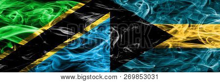 Tanzania Vs Bahamas, Bahamian Smoke Flags Placed Side By Side. Thick Colored Silky Smoke Flags Of Ta