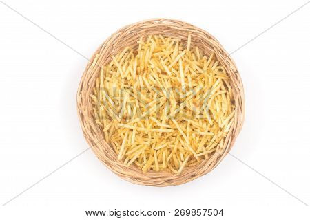 Potato Sticks In A Basket Bowl. Batata Palha Isolated On White Background. Top View