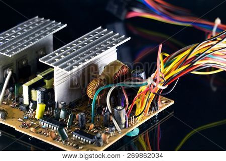 Open Power Supply On A Black Background, Close-up, Computer Equipment, Electrical Equipment