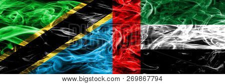 Tanzania Vs United Arab Emirates, Emirati Smoke Flags Placed Side By Side. Thick Colored Silky Smoke