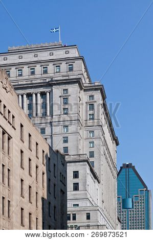 Montreal, Quebec, August 21, 2017 - Vertical Of The Tops Of The Old And New Architecture In Downtown
