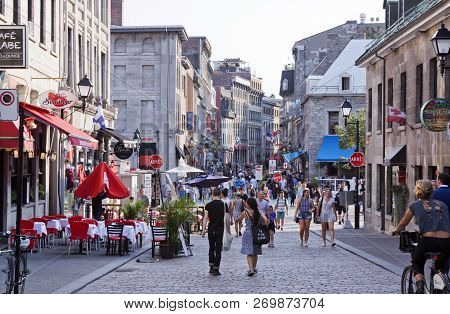 Montreal, Quebec, August 21, 2017 - Horizontal View Of The Cobbled Streets, Filled With Tourists, In