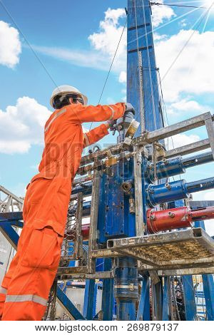 Offshore Oil Rig Worker Prepare Tool And Equipment For Perforation Gases Well At Wellhead Remote Pla