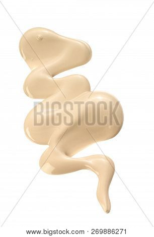 Beige Make Up Foundation Squiggle On White Background With Clipping Path