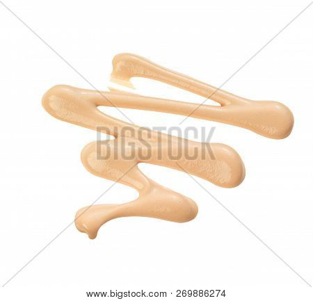 Beige Make Up Foundation Squiggle On White Background With Clipping Path