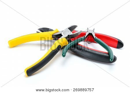 Three Different Types Of Side Cutters With Isolated Handles On White Background. Tool Isolated On Wh