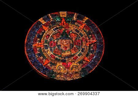 Typical Colored Clay Maya Calendar Isolated On Blackbackground