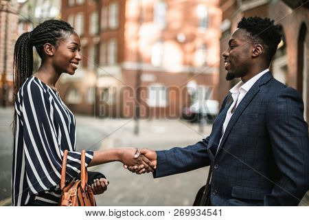 New business acquaintances shaking hands