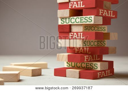 Success And Fail. Wooden Tower Of Blocks. Failure Is Like A New Step For Success. Failure Gives Expe