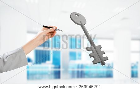 Cropped Image Of Businessman In Suit And Stone Key Symbol. Mixed Media