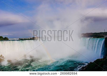 Inspiring View Of Niagara Falls With Rainbow