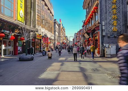 Beijing/china - 24 February 2017:unacquainted Chinese People Or Tourist Walking In Qianmen Street Th