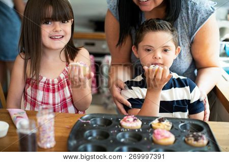 Family with fresh homemade cucakes