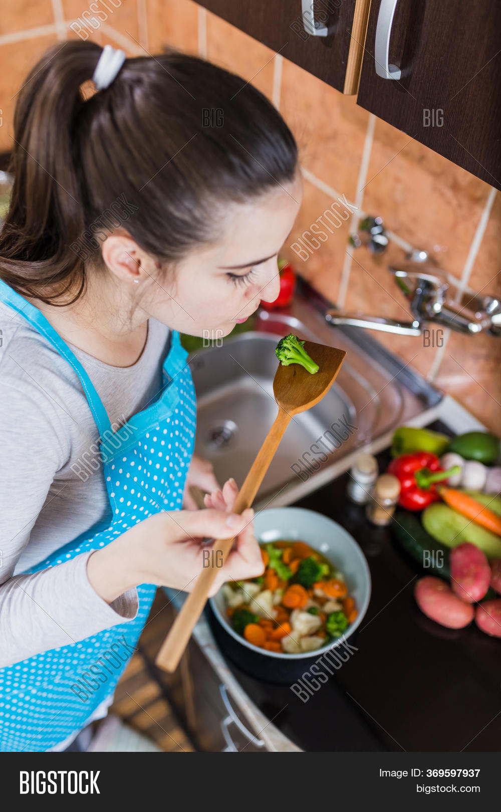 Woman Tasting Food Image & Photo (Free Trial) Bigstock