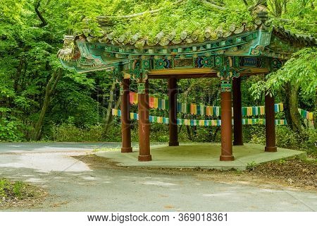 Haeinsa-gil, South Korea; May 26, 2020: Beautiful Oriental Pavilion Under Lush Foliage On Mountain H