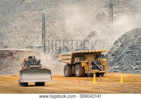 heavy machinery moving the kimberlite in an open pit mine in Botswana