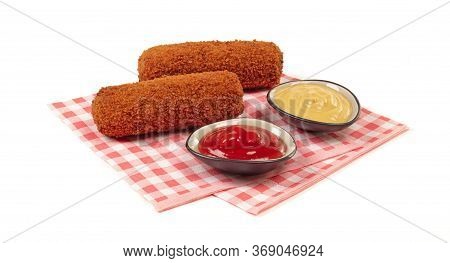 Brown Crusty Dutch Kroket With Sauces (mustard And Ketchup) Isolated On A White Background