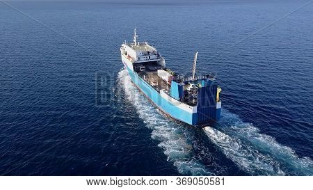 Ro Ro Ship: Aerial View Of A Medium Roro Vehicle Carrie Vessel Cruising At Sea.