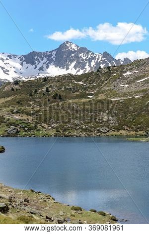 Beautiful View Hiking In The Andorra Pyrenees Mountains In Ordino, Near The Lakes Of Tristaina.
