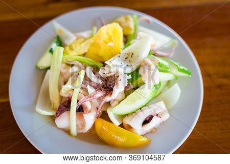 Fresh Squid With Pineapple In Restaurant