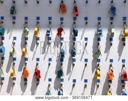White Board With Keys And Numbers. Hotel Keyboard. Beach Complex