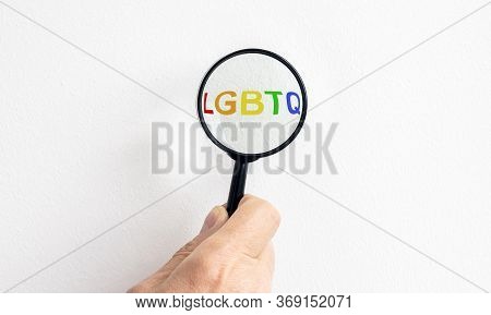 Concept Image Of Magnifying Glass Revealing The Lgbtq Acronym Word Text Inscription In Colors Of Lgb