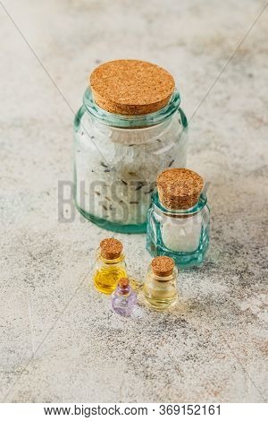 Aromatic Oils In Glass Bottles, Aromatic Salts And Dry Lavender. Concept Natural Ogranic Skincare Co