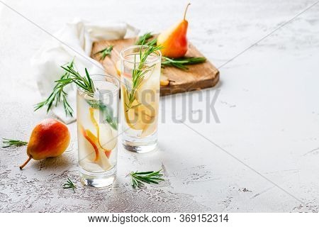 Summer Drinks, Rosemary Pear Cocktails With Ice In Glasses. Refreshing Summer Homemade Alcoholic Or 