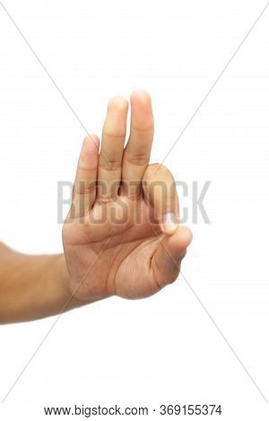 Shot Of Single Human Hand Doing Ahamkara Mudra Isolated On White.vertical Shot Of Hand Demonstrating