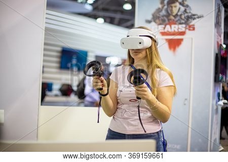 Moscow, Russia - October 04, 2019: Young Caucasian Girl In Dell Visor Windows Mixed Reality Headset 