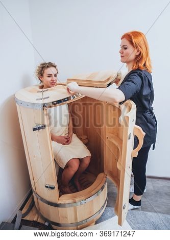 Beautiful Girl In Spa. Phyto Barrel. Clinic Of Aesthetic Medicine