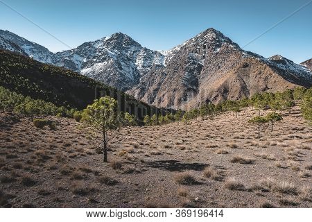 Snow Covered Peaks Of Toubkal National Park Morocco, High Atlas Mountains. Sunrise Light With Blue S