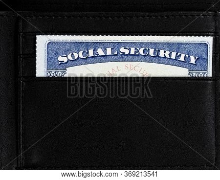 United States Social Security Card Inside Of Leather Wallet