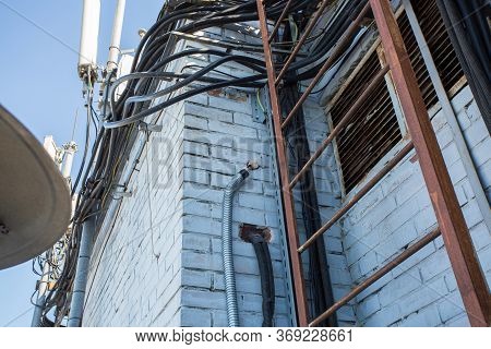 Russia, Saint-petersburg - April 30, 2018: Cables Are Near Of Climatic Vandal-proof Cabinet With Mic