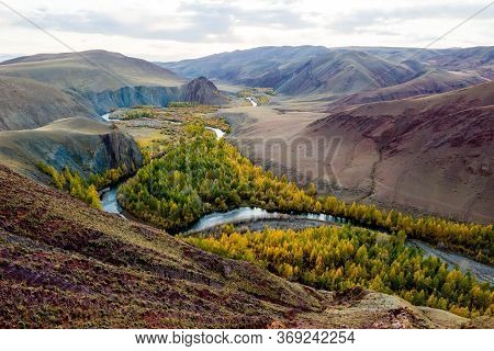 Beautiful Sun Valley And The Open River Kyzyltan Between The Mountains With Lush Clouds. Autumn Fore