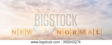 Wood Block New Normal. After Epidemic Covid-19 Virus Caused New Normal Worldwide.