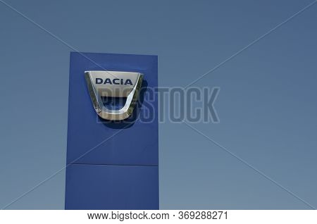 Manno, Ticino, Switzerland - 21st May 2020 : Dacia Dealership Sign Against Blue Sky. Dacia Was Found