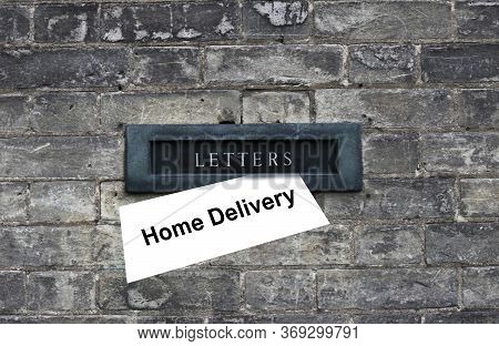 Daily Magazine, Letter With Sign Home Delivery Waiting To Be Picked Up From The Old Door Hole, Lette
