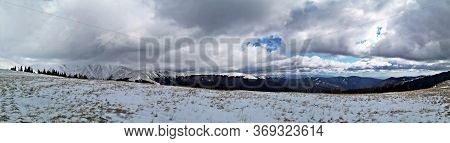 Panoramic Landscape In The Mountains. Winter Landscape.