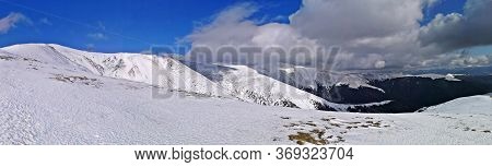 Trekking In The Mountains. Winter Landscape In The Mountains