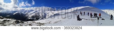 Iezer Mountains, Romania -  February 28, 2020: Hiking In The Mountains  During Winter