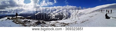 Iezer Mountains, Romania -  February 28, 2020: Hiking In The Mountains  During Winter