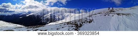 Iezer Mountains, Romania -  February 28, 2020: Hiking In The Mountains  During Winter