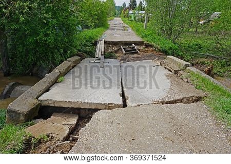 Destroyed Bridge After Flooding In A Village In The Forest