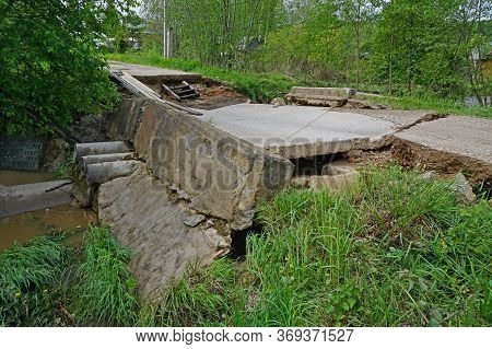 Destroyed Bridge After Flooding In A Village In The Forest