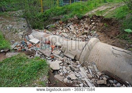 Destroyed Bridge After Flooding In A Village In The Forest