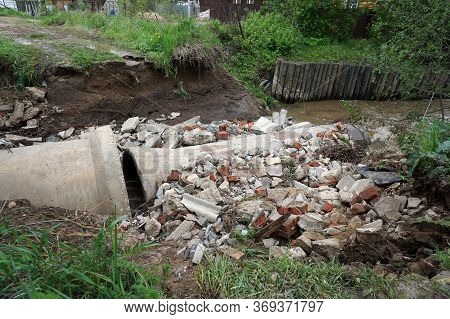 Destroyed Bridge After Flooding In A Village In The Forest