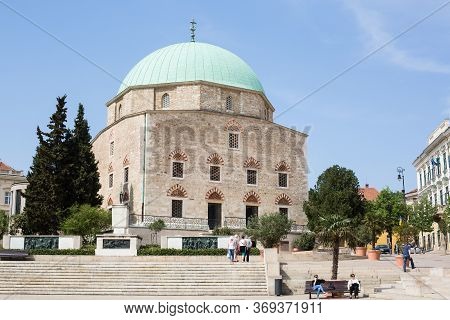 Pecs, Hungary - April 24 2018: Mosque Of Pasha Gazi Kassim On Sunny Day, Pecs, Hungary